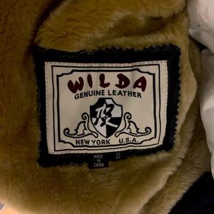 Small women’s leathercoat with fur inside & hoodie